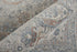 7' X 10' Silver Taupe and Blue Oriental Power Loom Worn Faded Area Rug With Fringe